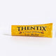Thentix Lip Balm tube, the best lip balm for dry lips, featuring honey and Shea Butter, nourishing formula.